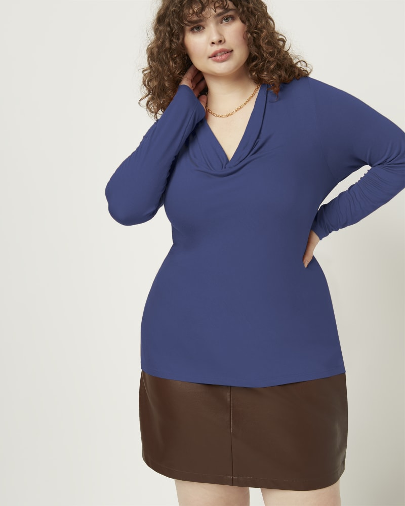 Front of a model wearing a size 1X Valery Cowl Neck Top in Azure Blue by East Adeline. | dia_product_style_image_id:253264